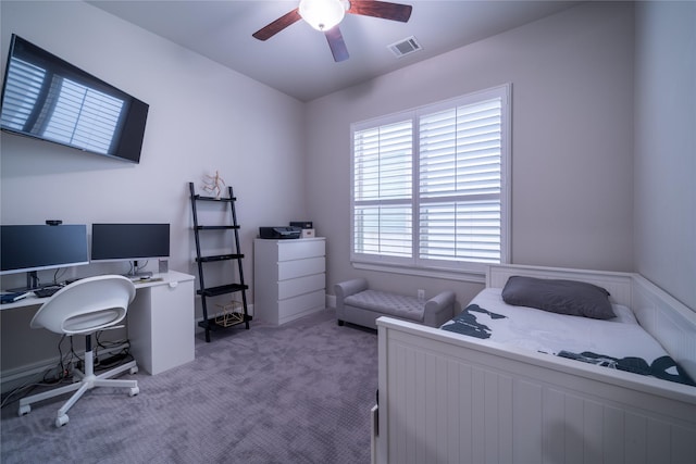 carpeted bedroom with ceiling fan