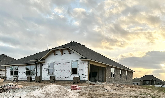 view of front of property featuring brick siding