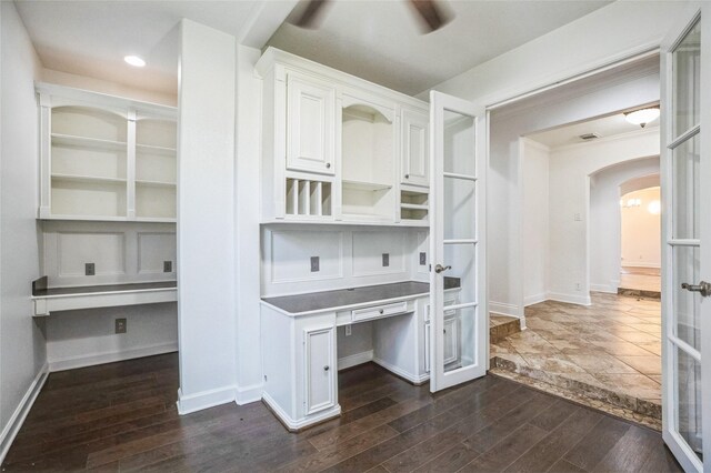 office space featuring french doors, ceiling fan, and dark hardwood / wood-style floors