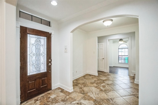 entryway featuring crown molding