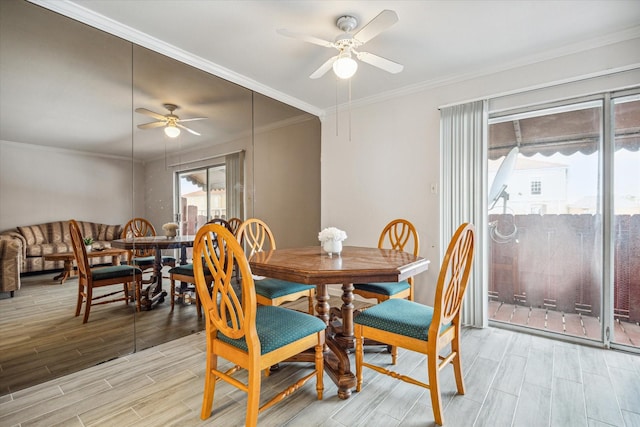 dining room featuring ceiling fan and ornamental molding