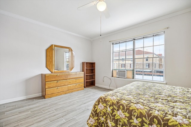 bedroom featuring ornamental molding, cooling unit, ceiling fan, and light hardwood / wood-style floors