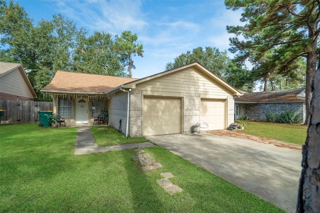 ranch-style home featuring a garage and a front yard