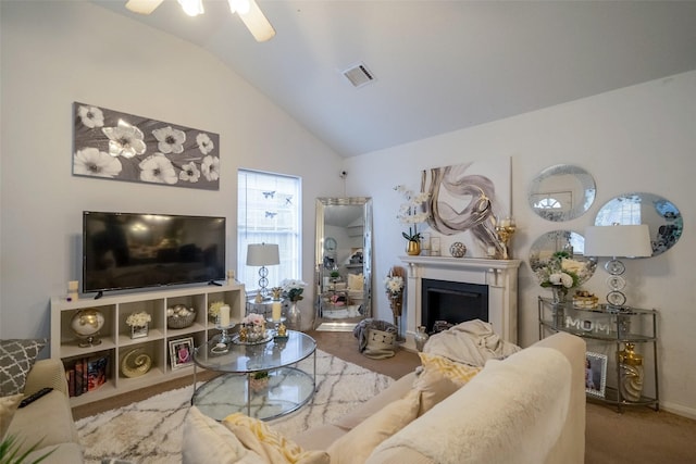 carpeted living room with lofted ceiling