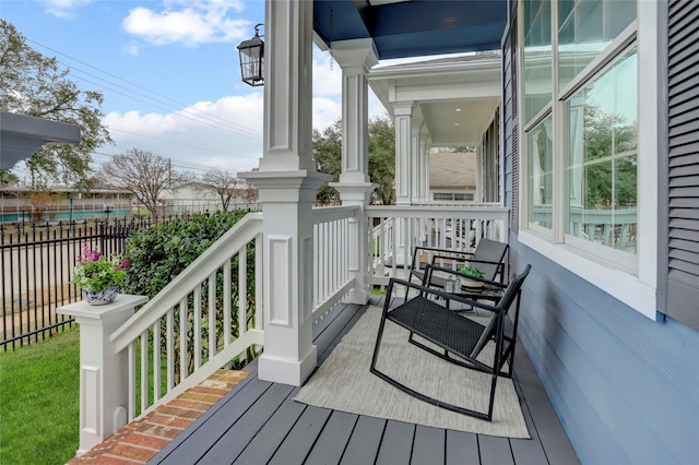 wooden deck featuring covered porch