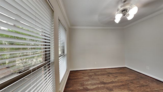 unfurnished room with ornamental molding and dark wood-type flooring