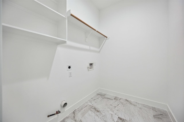 clothes washing area featuring gas dryer hookup, hookup for a washing machine, and electric dryer hookup