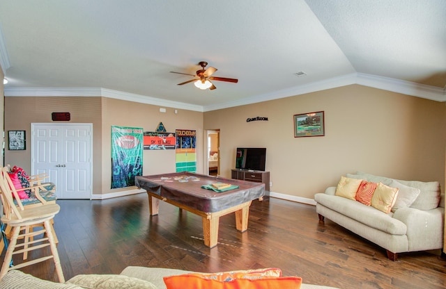 playroom with dark wood-type flooring, lofted ceiling, and crown molding