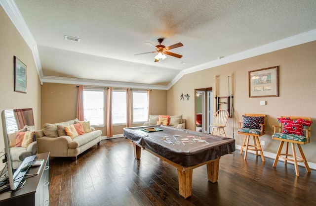 game room featuring lofted ceiling, crown molding, ceiling fan, dark hardwood / wood-style floors, and a textured ceiling