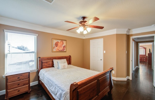 bedroom with dark wood-type flooring, ceiling fan, and ornamental molding