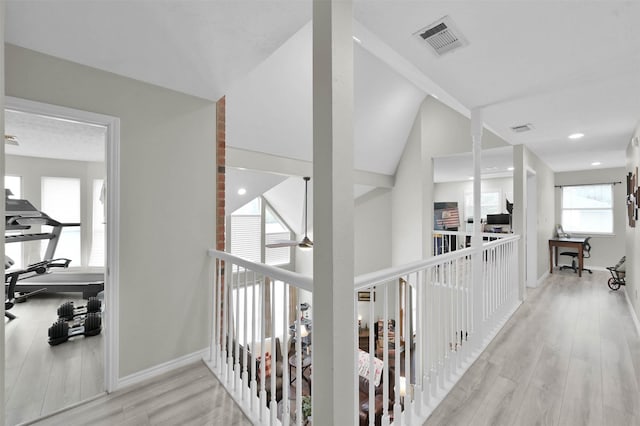 hall with light hardwood / wood-style flooring