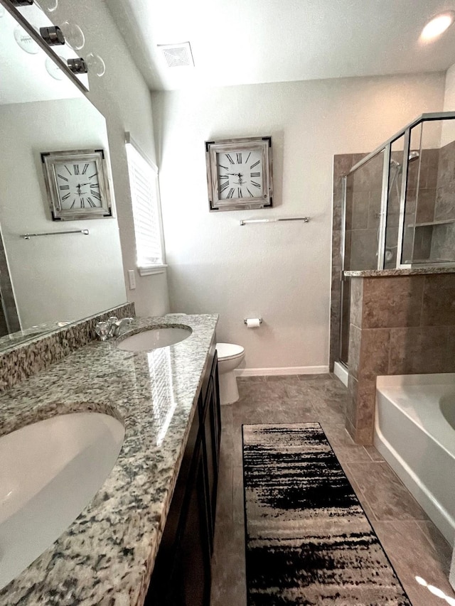 full bathroom with vanity, plus walk in shower, and toilet