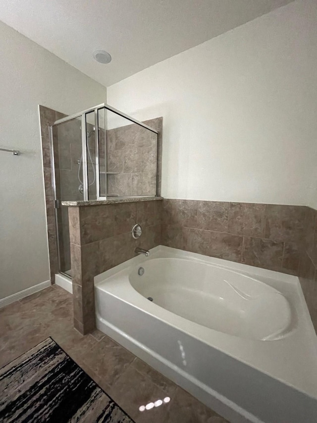 bathroom featuring plus walk in shower