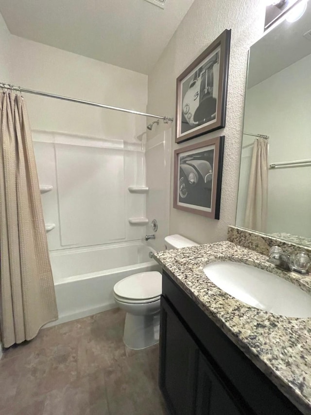 full bathroom featuring vanity, shower / tub combo with curtain, and toilet