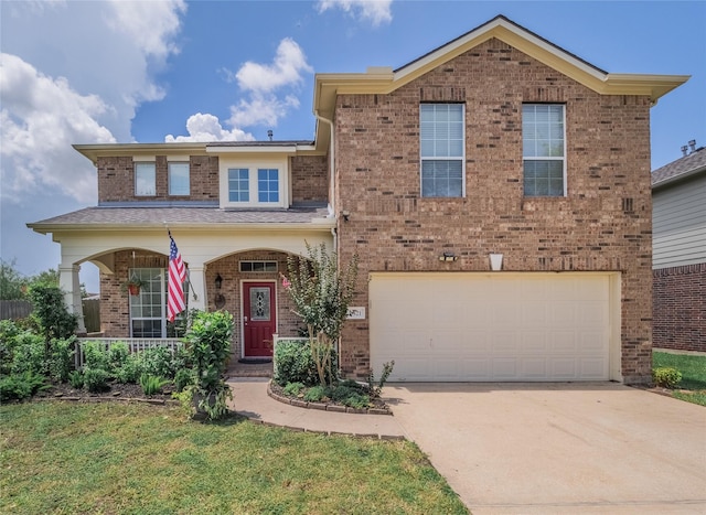 traditional-style home with concrete driveway, an attached garage, and brick siding