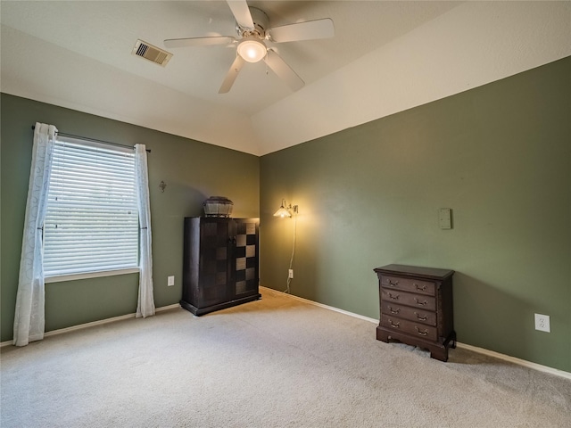 miscellaneous room featuring light carpet, lofted ceiling, and ceiling fan