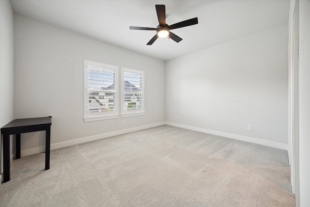 carpeted empty room with ceiling fan