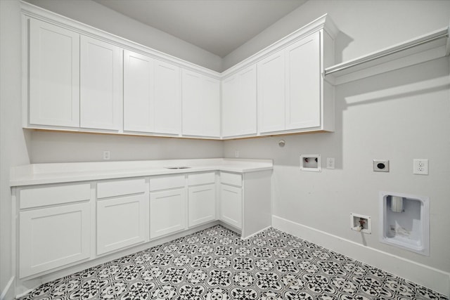 laundry room featuring cabinets, electric dryer hookup, and washer hookup