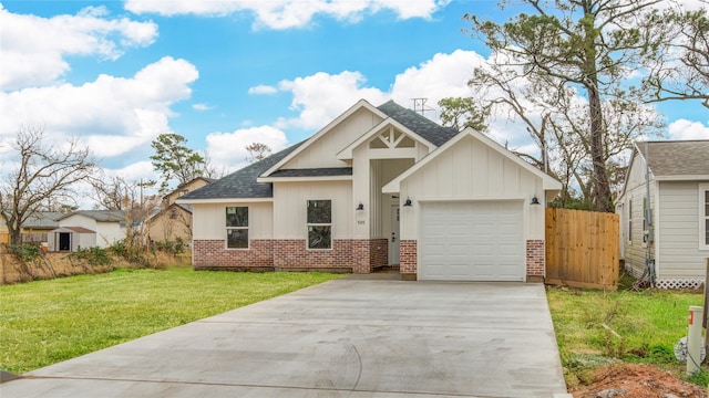 view of front facade featuring a garage and a front yard