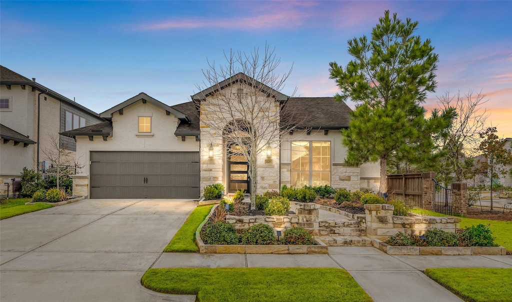 view of front of property with a garage