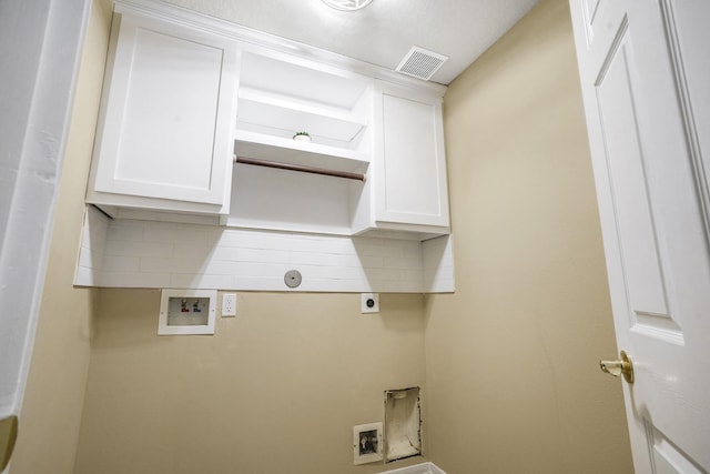 laundry room featuring cabinets, electric dryer hookup, and washer hookup