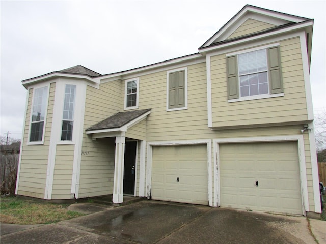 view of front of property with a garage