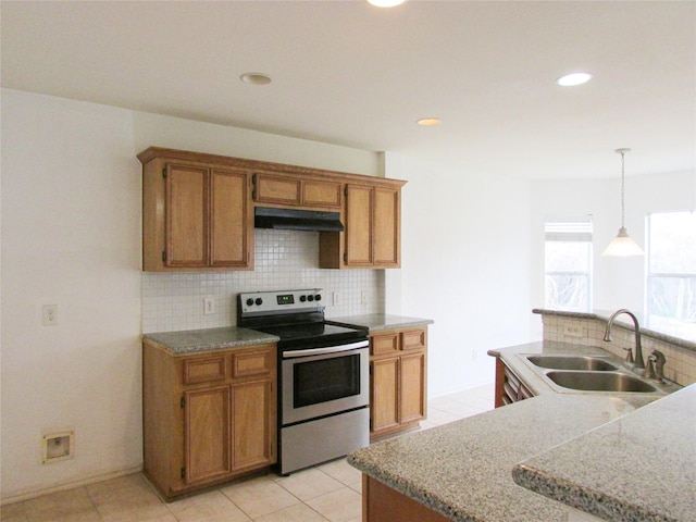 kitchen featuring sink, decorative backsplash, hanging light fixtures, light tile patterned floors, and stainless steel electric range