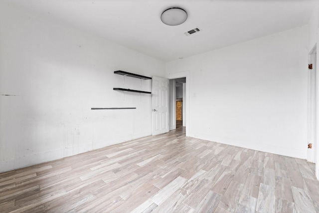 empty room featuring light wood-type flooring