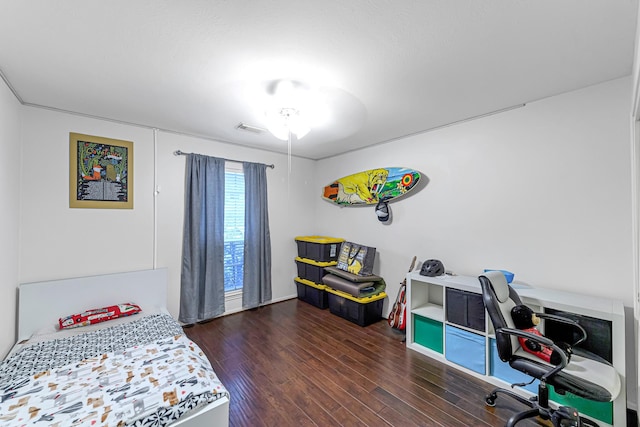 bedroom featuring dark wood-type flooring