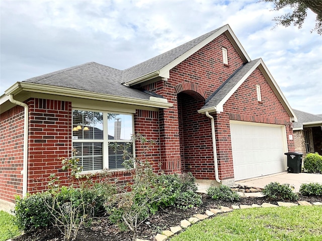 single story home featuring a garage