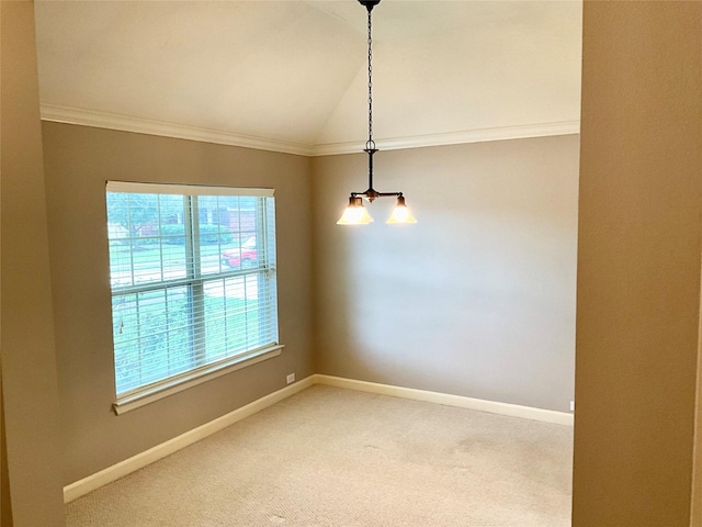 unfurnished room with lofted ceiling, crown molding, and carpet