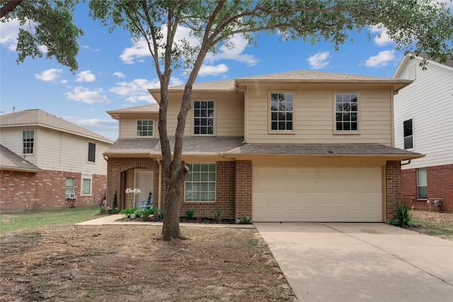 front of property with a garage