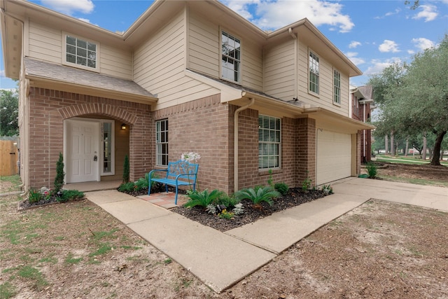 view of front of home with a garage