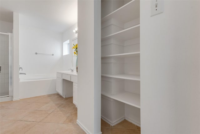 bathroom with vanity, separate shower and tub, and tile patterned flooring