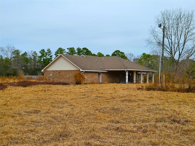 exterior space with a yard