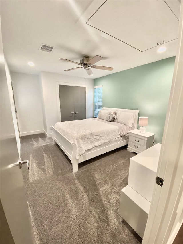 carpeted bedroom with ceiling fan