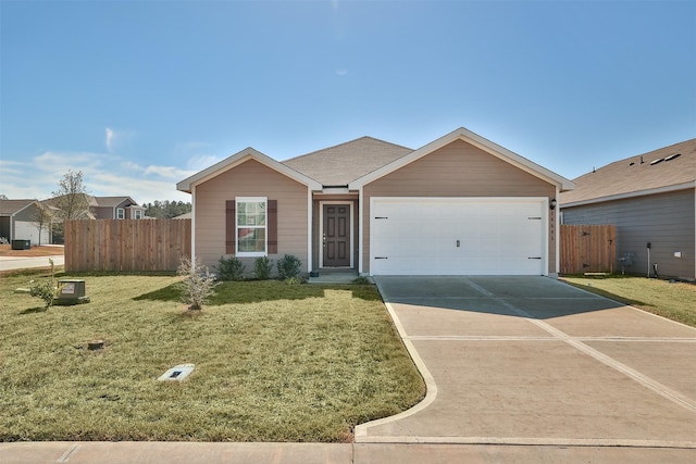 single story home featuring a garage and a front yard