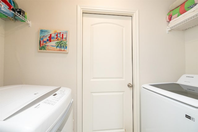 laundry area with washer and dryer