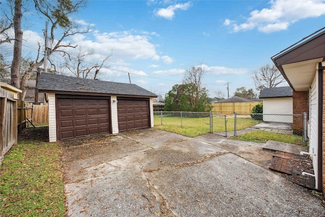 garage with a lawn