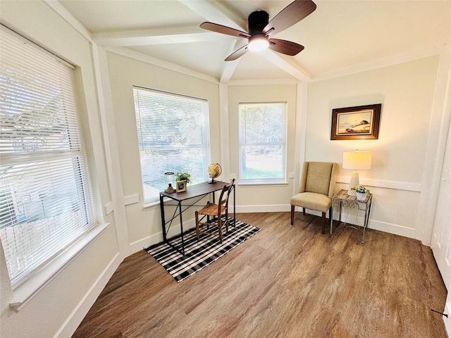 living area with ceiling fan, ornamental molding, and hardwood / wood-style floors