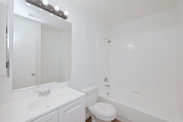 full bathroom featuring vanity, toilet, and washtub / shower combination