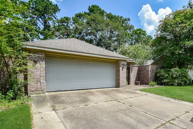 garage with a yard