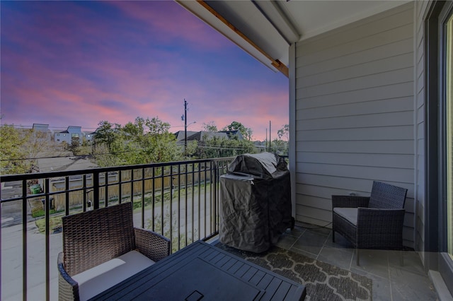 balcony at dusk with grilling area