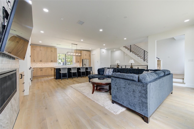 living room with light wood-type flooring