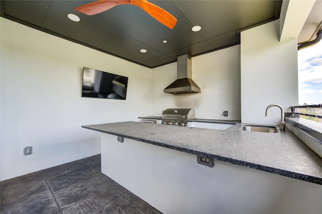 view of patio / terrace featuring sink, a grill, and an outdoor kitchen