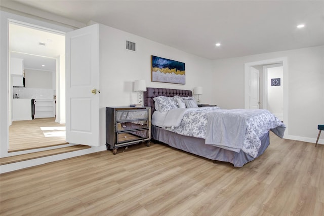 bedroom featuring light hardwood / wood-style flooring