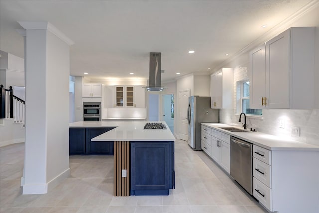 kitchen featuring a kitchen island, appliances with stainless steel finishes, island range hood, white cabinetry, and sink