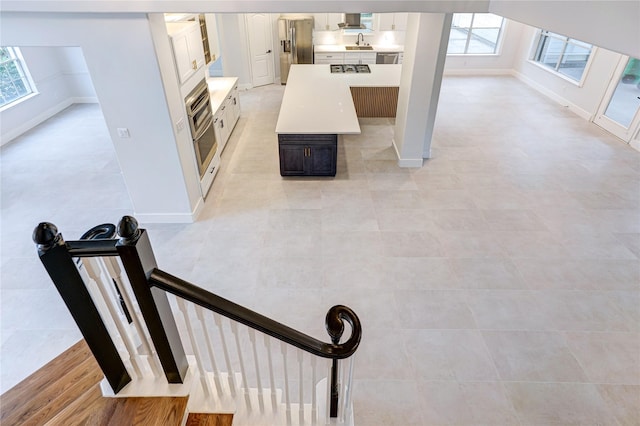 stairs featuring sink