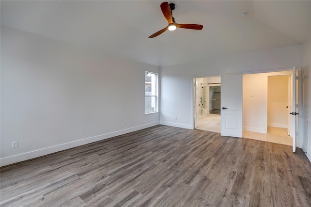 interior space with light hardwood / wood-style floors and ceiling fan