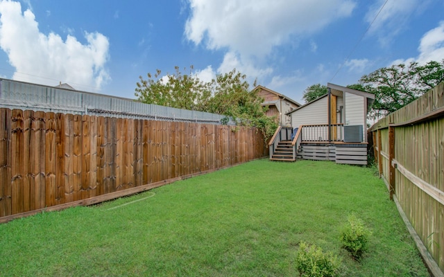 view of yard featuring a deck